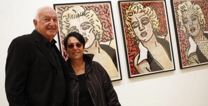 Don and Mera Rubell at their collection in front Keith Haring’s “Marilyn” Paintings.